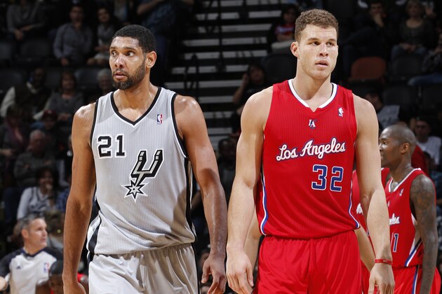 SAN ANTONIO, TX - JANUARY 4:  Tim Duncan #21 of the San Antonio Spurs and Blake Griffin #32 of the Los Angeles Clippers during the game on January 4, 2014 at the AT&T Center in San Antonio, Texas. NOTE TO USER: User expressly acknowledges and agrees that, by downloading and/or using this photograph, user is consenting to the terms and conditions of the Getty Images License Agreement. Mandatory Copyright Notice: Copyright 2014 NBAE (Photo by Chris Covatta/NBAE via Getty Images)