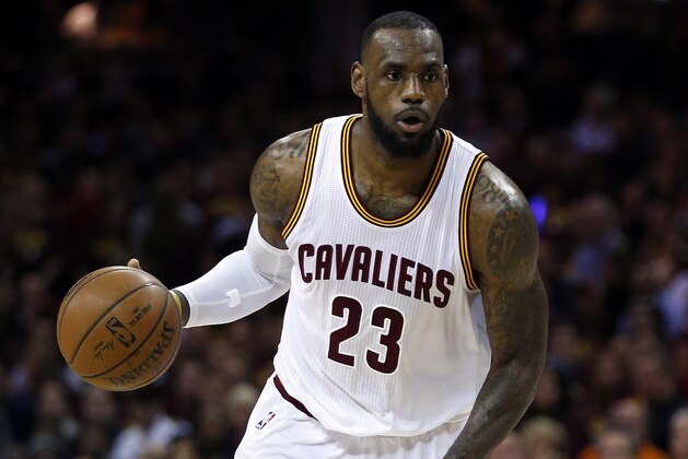 CLEVELAND, OH - JUNE 16:  LeBron James #23 of the Cleveland Cavaliers drives against the Golden State Warriors during Game Six of the 2015 NBA Finals at Quicken Loans Arena on June 16, 2015 in Cleveland, Ohio. NOTE TO USER: User expressly acknowledges and agrees that, by downloading and or using this photograph, user is consenting to the terms and conditions of Getty Images License Agreement.  (Photo by Ezra Shaw/Getty Images)