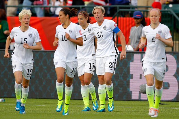 EDMONTON, AB - JUNE 22:  Alex Morgan #13 and Abby Wambach #20 of the United States celebrate after Morgan scores her first goal against goalkeeper Stefany Castano #1 of Colombia in the second half in the FIFA Women's World Cup 2015 Round of 16 match at Commonwealth Stadium on June 22, 2015 in Edmonton, Canada.  (Photo by Kevin C. Cox/Getty Images)