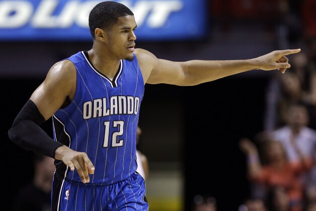 Orlando Magic forward Tobias Harris (12) reacts after shooting a 3-point shot during the second half of an NBA basketball game against the Miami Heat, Monday, Dec. 29, 2014, in Miami. The Magic defeated the Heat 102-101. (AP Photo/Lynne Sladky)