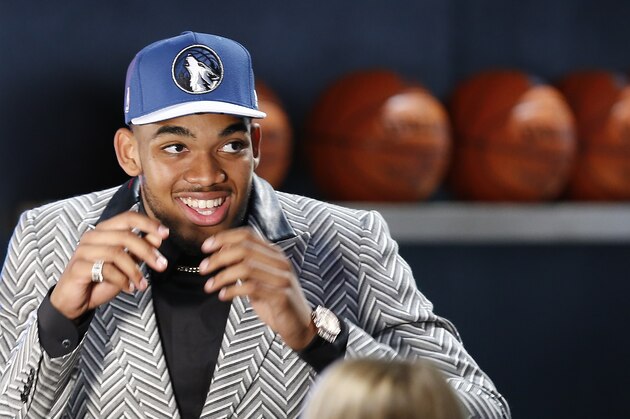 Karl-Anthony Towns reacts after being selected first overall by the Minnesota Timberwolves during the NBA basketball draft, Thursday, June 25, 2015, in New York. (AP Photo/Kathy Willens)