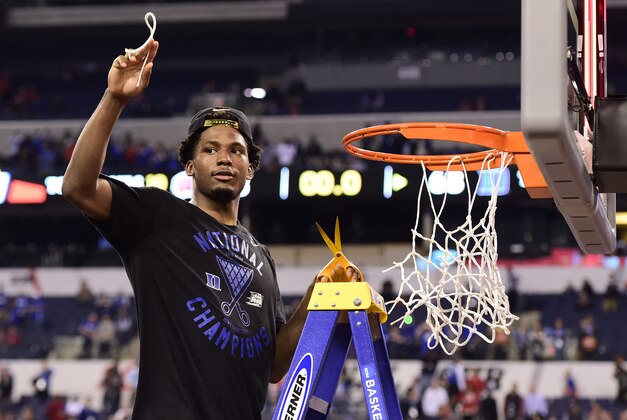 Apr 6, 2015; Indianapolis, IN, USA; Duke Blue Devils forward Justise Winslow holds up a piece of the net after defeating the Wisconsin Badgers in the 2015 NCAA Men's Division I Championship game at Lucas Oil Stadium. Mandatory Credit: Bob Donnan-USA TODAY Sports