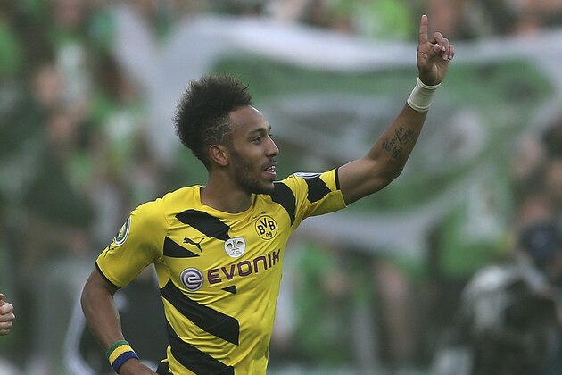 Dortmund's Pierre-Emerick Aubameyang from Gaboon celebrates after scoring the opening goal during the German soccer cup final match between Borussia Dortmund and VfL Wolfsburg in Berlin, Germany, Saturday, May 30, 2015. (AP Photo/Markus Schreiber)