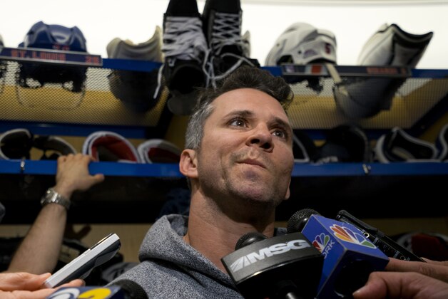 New York Rangers Martin St. Louis speaks in the locker room at the team's Westchester training facility in Greenburgh, N.Y., Monday, June 1, 2015. The Rangers came up a game short of making the Stanley Cup finals for the second straight year. (AP Photo/Craig Ruttle)