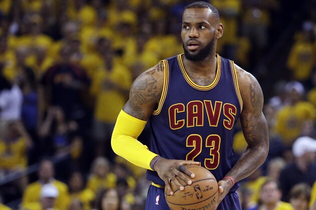 Cleveland Cavaliers forward LeBron James (23) against the Golden State Warriors during the first half of Game 5 of basketball's NBA Finals in Oakland, Calif., Sunday, June 14, 2015. (AP Photo/Ben Margot)