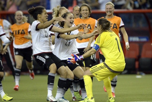 Jun 26, 2015; Montreal, Quebec, CAN; Germany goalkeeper Nadine Angerer (1) celebrates with teammates after making a save on the final penalty kick to defeat France during in penalty kicks during the quarterfinals of the FIFA 2015 Women's World Cup at Olympic Stadium. Mandatory Credit: Eric Bolte-USA TODAY Sports