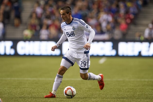 VANCOUVER, BC - MARCH 28: Octavio Rivero #29 of the Vancouver Whitecaps FC runs with the ball in MLS action against the Portland Timbers on March 28, 2015 at BC Place Stadium in Vancouver, British Columbia, Canada.  (Photo by Rich Lam/Getty Images)