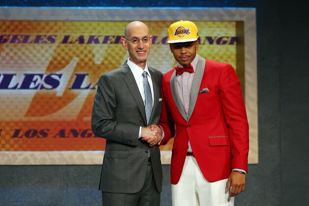 NEW YORK, NY - JUNE 25: D'Angelo Russell poses with Commissioner Adam Silver after being drafted second overall by the Los Angeles Lakers in the First Round of the 2015 NBA Draft at the Barclays Center on June 25, 2015 in the Brooklyn borough of  New York City. NOTE TO USER: User expressly acknowledges and agrees that, by downloading and or using this photograph, User is consenting to the terms and conditions of the Getty Images License Agreement.  (Photo by Elsa/Getty Images)