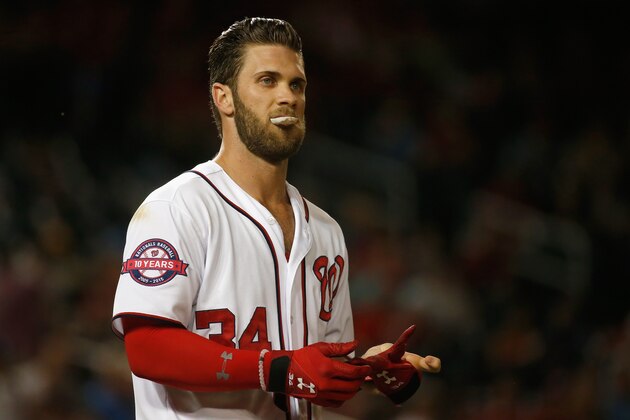 WASHINGTON, DC - JUNE 23:  Bryce Harper #34 of the Washington Nationals looks on after flying out for the third out of the first inning against the Atlanta Braves at Nationals Park on June 23, 2015 in Washington, DC.  (Photo by Rob Carr/Getty Images)