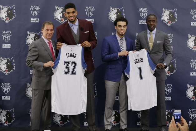 Minnesota Timberwolves head coach Flip Saunders, left, and draft picks Karl-Anthony Towns and Tyus Jones with general manager Milt Newton, right, for photos during an NBA basketball news conference in Minneapolis, Friday, June 26, 2015. Towns was the No. 1 overall pick, while Jones was selected 24th, in the NBA draft the night before. (AP Photo/Ann Heisenfelt) Minnesota Timberwolves head coach Flip Saunders, left, and draft picks Karl-Anthony Towns and Tyus Jones with general manager Milt Newton, right, for photos during an NBA basketball news conference in Minneapolis, Friday, June 26, 2015. Towns was the No. 1 overall pick, while Jones was selected 24th, in the NBA draft the night before. (AP Photo/Ann Heisenfelt)
