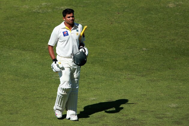 ABU DHABI, UNITED ARAB EMIRATES - NOVEMBER 10:  Azhar Ali of Pakistan leaves the wicket bowled by Ish Sodhi of New Zealand during day two of the first test between Pakistan and New Zealand at Sheikh Zayed stadium on November 10, 2014 in Abu Dhabi, United Arab Emirates.  (Photo by Warren Little/Getty Images)