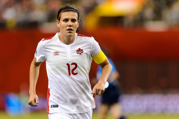 MONTREAL, QC - JUNE 15:  Christine Sinclair #12 of Canada runs during the 2015 FIFA Women's World Cup Group A match against the Netherlands at Olympic Stadium on June 15, 2015 in Montreal, Quebec, Canada.  Final score between Canada and the Netherlands 1-1. (Photo by Minas Panagiotakis/Getty Images)