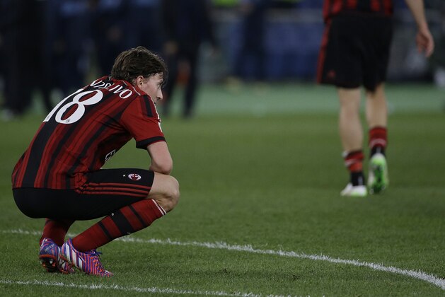 AC Milan's Riccardo Montolivo looks on at the end of a Serie A soccer match between Lazio and AC Milan in Rome's Olympic stadium, Saturday, Jan. 24, 2015. (AP Photo/Gregorio Borgia)