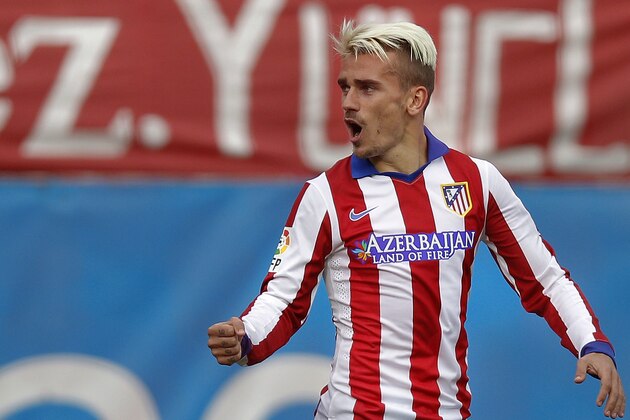 Atletico's Antoine Griezmann celebrates his goal during a Spanish La Liga soccer match between Atletico Madrid and Elche at the Vicente Calderon stadium in Madrid, Spain, Saturday, April 25, 2015. (AP Photo/Andres Kudacki)