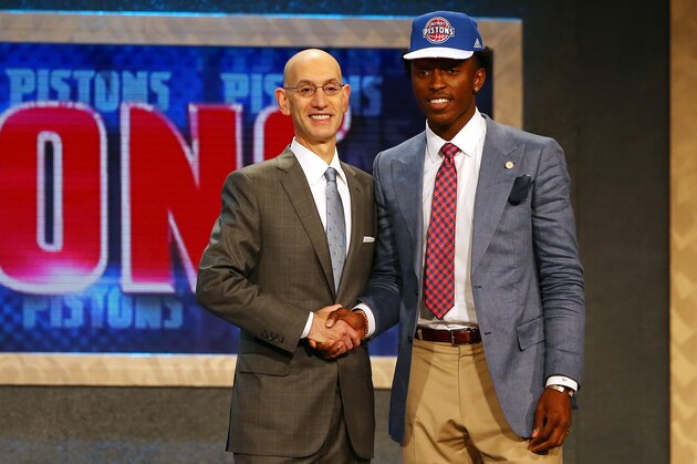 NEW YORK, NY - JUNE 25:  Stanley Johnson poses with Commissioner Adam Silver after being selected eighth overall by the Detroit Pistons in the First Round of the 2015 NBA Draft at the Barclays Center on June 25, 2015 in the Brooklyn borough of  New York City. NOTE TO USER: User expressly acknowledges and agrees that, by downloading and or using this photograph, User is consenting to the terms and conditions of the Getty Images License Agreement.  (Photo by Elsa/Getty Images)