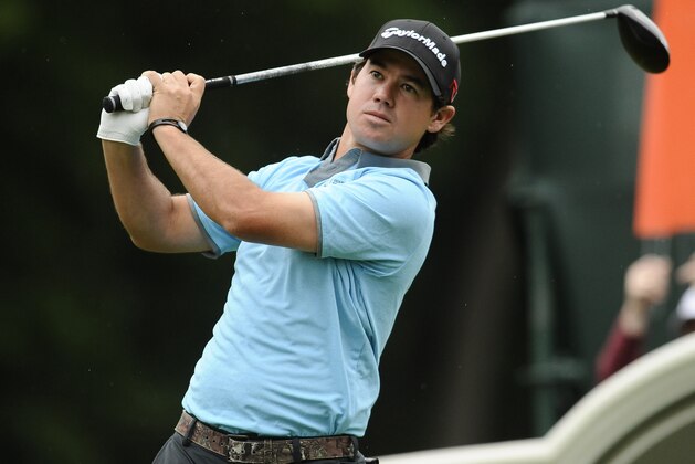 Brian Harman tees off on the 18th hole during the third round of the Travelers Championship golf tournament, Saturday, June 27, 2015, in Cromwell, Conn.  (AP Photo/Jessica Hill)