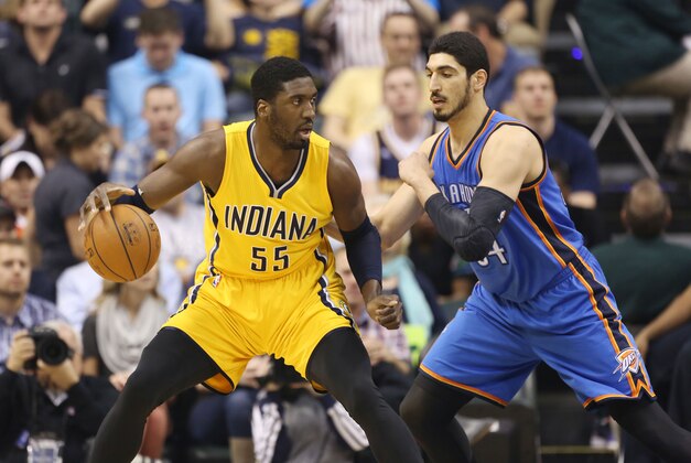 Apr 12, 2015; Indianapolis, IN, USA; Indiana Pacers center Roy Hibbert (55) posts up against Oklahoma City Thunder center Enes Kanter (34) at Bankers Life Fieldhouse. Mandatory Credit: Brian Spurlock-USA TODAY Sports