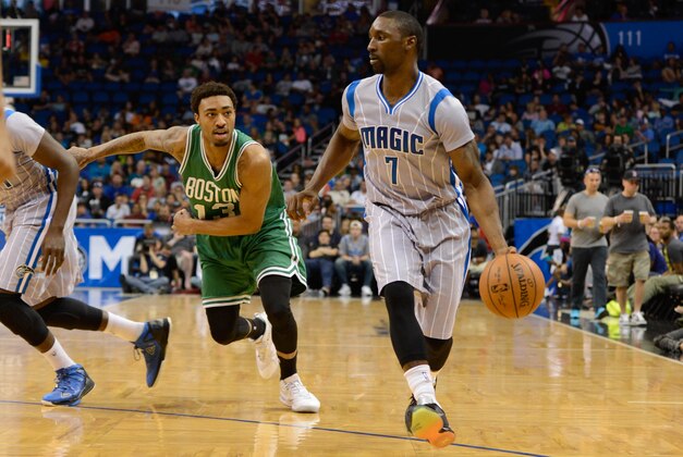 Mar 8, 2015; Orlando, FL, USA; Orlando Magic guard Ben Gordon (7) dribbles as Boston Celtics guard James Young (13) defends during the second quarter at Amway Center. Orlando Magic defeated Boston Celtics 103-98. Mandatory Credit: Tommy Gilligan-USA TODAY Sports