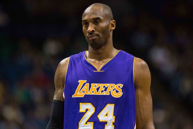 Dec 14, 2014; Minneapolis, MN, USA; Los Angeles Lakers guard Kobe Bryant (24) looks on against the Minnesota Timberwolves at Target Center. The Lakers defeated the Timberwolves 100-94. Mandatory Credit: Brace Hemmelgarn-USA TODAY Sports