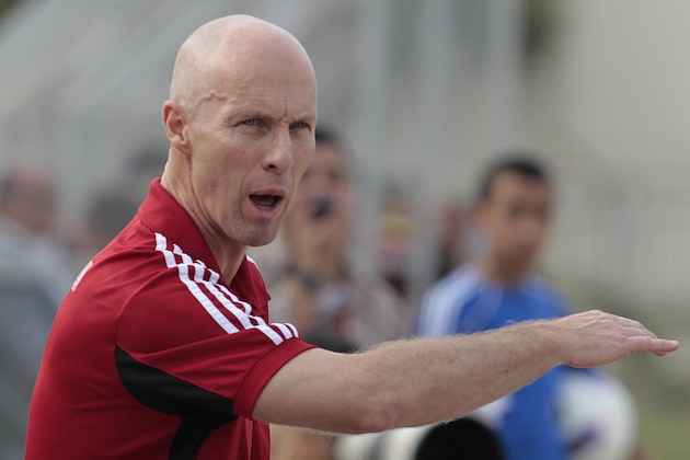 Egypt's coach Bob Bradley from the U.S. gestures during a friendly soccer match between the Lebanese and Egyptian national teams, in the northern port city of Tripoli, Lebanon, Friday May 11, 2012. Egypt won 4-1. (AP Photo/Hussein Malla)