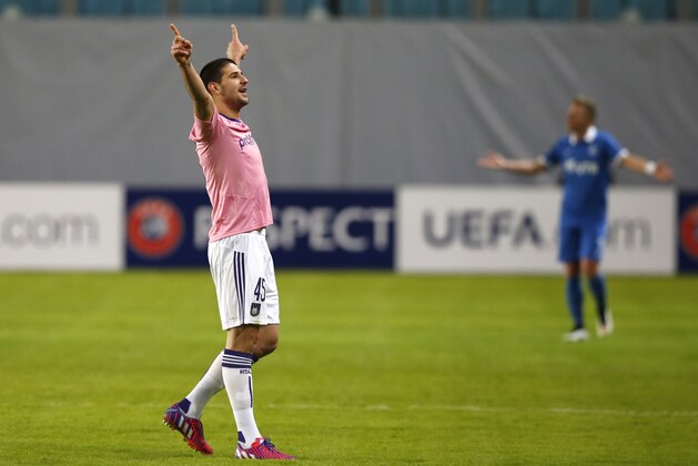 Anderlecht’s Aleksandar Mitrovic celebrates after scoring against Dinamo Moscow during their Europa League Round of 32 second leg soccer match at the Arena Khimki stadium in Moscow, Russia, Thursday, Feb. 26, 2015. (AP Photo/Pavel Golovkin)