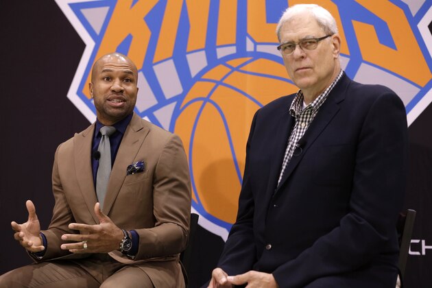 While New York Knicks president Phil Jackson, right, listens, Derek Fisher speaks during a news conference in Tarrytown, N.Y., Tuesday, June 10, 2014. The New York Knicks hired Fisher as their new coach on Tuesday, with Jackson turning to one of his trustiest former players. (AP Photo/Seth Wenig)
