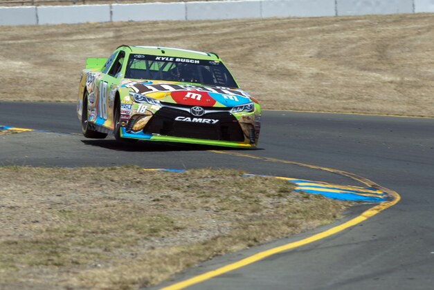Jun 26, 2015; Sonoma, CA, USA; Sprint Cup Series driver Kyle Busch (18) drives during practice for the Toyota/Save Mart 350 at Sonoma Raceway. Mandatory Credit: Ed Szczepanski-USA TODAY Sports