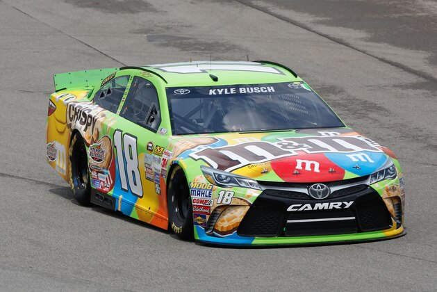 Jun 14, 2015; Brooklyn, MI, USA; Sprint Cup Series driver Kyle Busch (18) during the Quicken Loans 400 at Michigan International Speedway. Mandatory Credit: Aaron Doster-USA TODAY Sports
