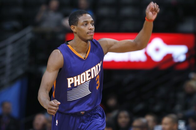Phoenix Suns guard Brandon Knight reacts after hitting a 3-point basket against the Denver Nuggets late in the fourth quarter of an NBA basketball game Wednesday, Feb. 25, 2015, in Denver. The Suns won 110-96. (AP Photo/David Zalubowski)