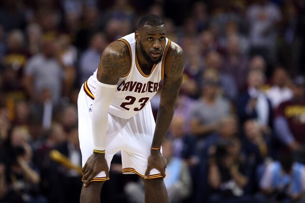 CLEVELAND, OH - JUNE 16:  LeBron James #23 of the Cleveland Cavaliers reacts against the Golden State Warriors during Game Six of the 2015 NBA Finals at Quicken Loans Arena on June 16, 2015 in Cleveland, Ohio. NOTE TO USER: User expressly acknowledges and agrees that, by downloading and or using this photograph, user is consenting to the terms and conditions of Getty Images License Agreement.  (Photo by Ezra Shaw/Getty Images)