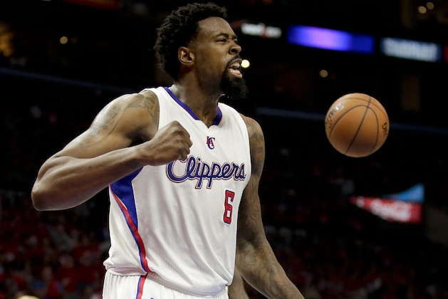 Los Angeles Clippers center DeAndre Jordan celebrates against the San Antonio Spurs during the first half of Game 1 of a first-round NBA basketball  playoff series in Los Angeles, Sunday, April 19, 2015. (AP Photo/Chris Carlson)
