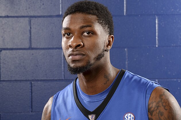 In this Oct. 15, 2014 photo, University of Florida's Chris Walker (23)  poses for 2014-2015 basketball season photos during Media Day in Gainesville, Fla. Florida's record-setting run through the Southeastern Conference and the NCAA tournament last season will be difficult, maybe even impossible, to top. (AP Photo/Phil Sandlin)