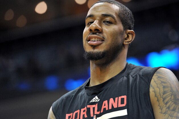 Portland Trail Blazers forward LaMarcus Aldridge warms up before an NBA basketball game Saturday, Jan. 17, 2015, in Memphis, Tenn. (AP Photo/Brandon Dill)