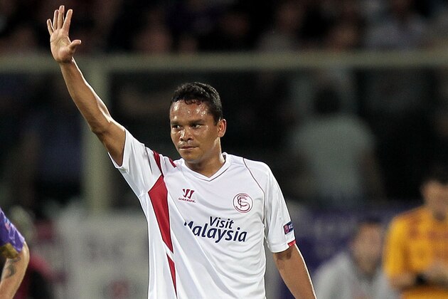 FLORENCE, ITALY - MAY 14: Carlos Bacca of FC Sevilla celebrates after scoring a goal during the UEFA Europa League Semi Final match between ACF Fiorentina and FC Sevilla on May 14, 2015 in Florence, Italy.  (Photo by Gabriele Maltinti/Getty Images)