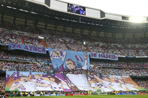 MADRID, SPAIN - MAY 13:  Real Madrid fans hold up banners prior to kickoff during the UEFA Champions League Semi Final, second leg match between Real Madrid and Juventus at Estadio Santiago Bernabeu on May 13, 2015 in Madrid, Spain.  (Photo by Alex Livesey/Getty Images)