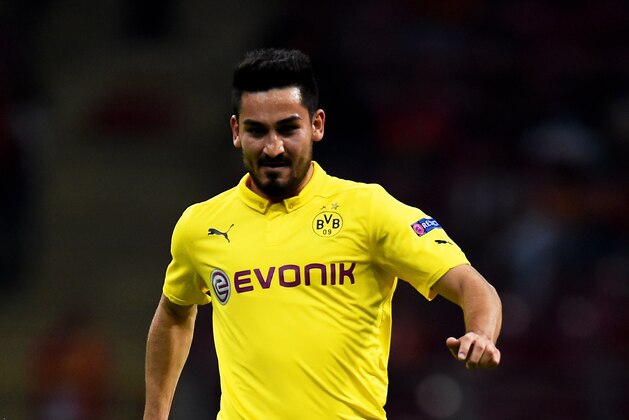 ISTANBUL, TURKEY - OCTOBER 22:  Ilkay Gundogan of Borussia Dortmund runs with the ball during UEFA Champions League Group D match between Galatasaray and Borussia Dortmund at Turk Telekom Arena on October 22, 2014 in Istanbul, Turkey.  (Photo by Lars Baron/Getty Images)