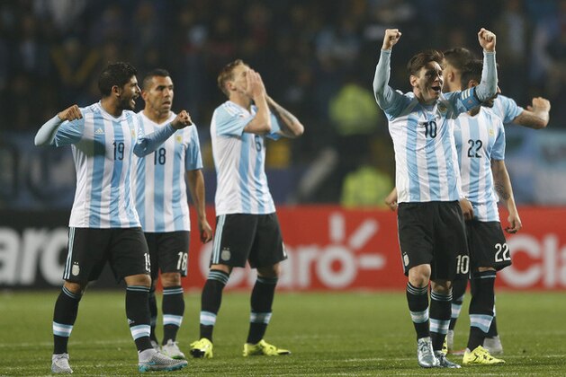 Argentina's Lionel Messi , right, celebrates during the penalty shootout during a Copa America quarterfinal soccer match at the Sausalito Stadium in Vina del Mar, Chile, Friday, June 26, 2015. Argentina defeated Colombia 5-4 on penalties after a 0-0 draw on Friday to reach the semifinals of the Copa America.(AP Photo/Andre Penner)