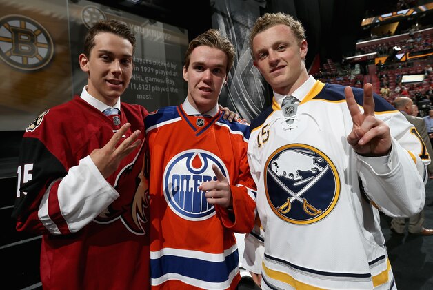 SUNRISE, FL - JUNE 26:  (L-R) Third overall pick Dylan Strome of the the Arizona Coyotes, first overall pick Connor McDavid of the Edmonton Oilers and second overall pick Jacck Eichel of the Buffalo Sabres pose together during Round One of the 2015 NHL Draft at BB&T Center on June 26, 2015 in Sunrise, Florida.  (Photo by Dave Sandford/NHLI via Getty Images)