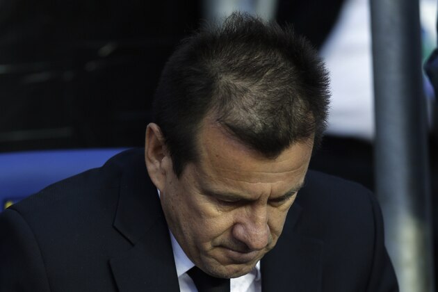 Brazil's coach Dunga sits on the bench before  a Copa America quarterfinal soccer match against Paraguay at the Ester Roa Rebolledo Stadium in Concepcion, Chile, Saturday, June 27, 2015. (AP Photo/Natacha Pisarenko)