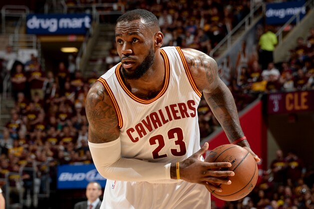 CLEVELAND, OH - JUNE 16: LeBron James #23 of the Cleveland Cavaliers handles the basketball during Game Six of the 2015 NBA Finals at The Quicken Loans Arena on June 16, 2015 in Cleveland, Ohio. NOTE TO USER: User expressly acknowledges and agrees that, by downloading and/or using this Photograph, user is consenting to the terms and conditions of the Getty Images License Agreement. Mandatory Copyright Notice: Copyright 2015 NBAE (Photo by Andrew D. Bernstein/NBAE via Getty Images)