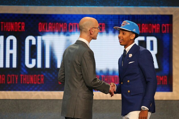 Jun 25, 2015; Brooklyn, NY, USA; Cameron Payne (Murray State) greets NBA commissioner Adam Silver after being selected as the number fourteen overall pick to the Oklahoma City Thunder in the first round of the 2015 NBA Draft at Barclays Center. Mandatory Credit: Brad Penner-USA TODAY Sports