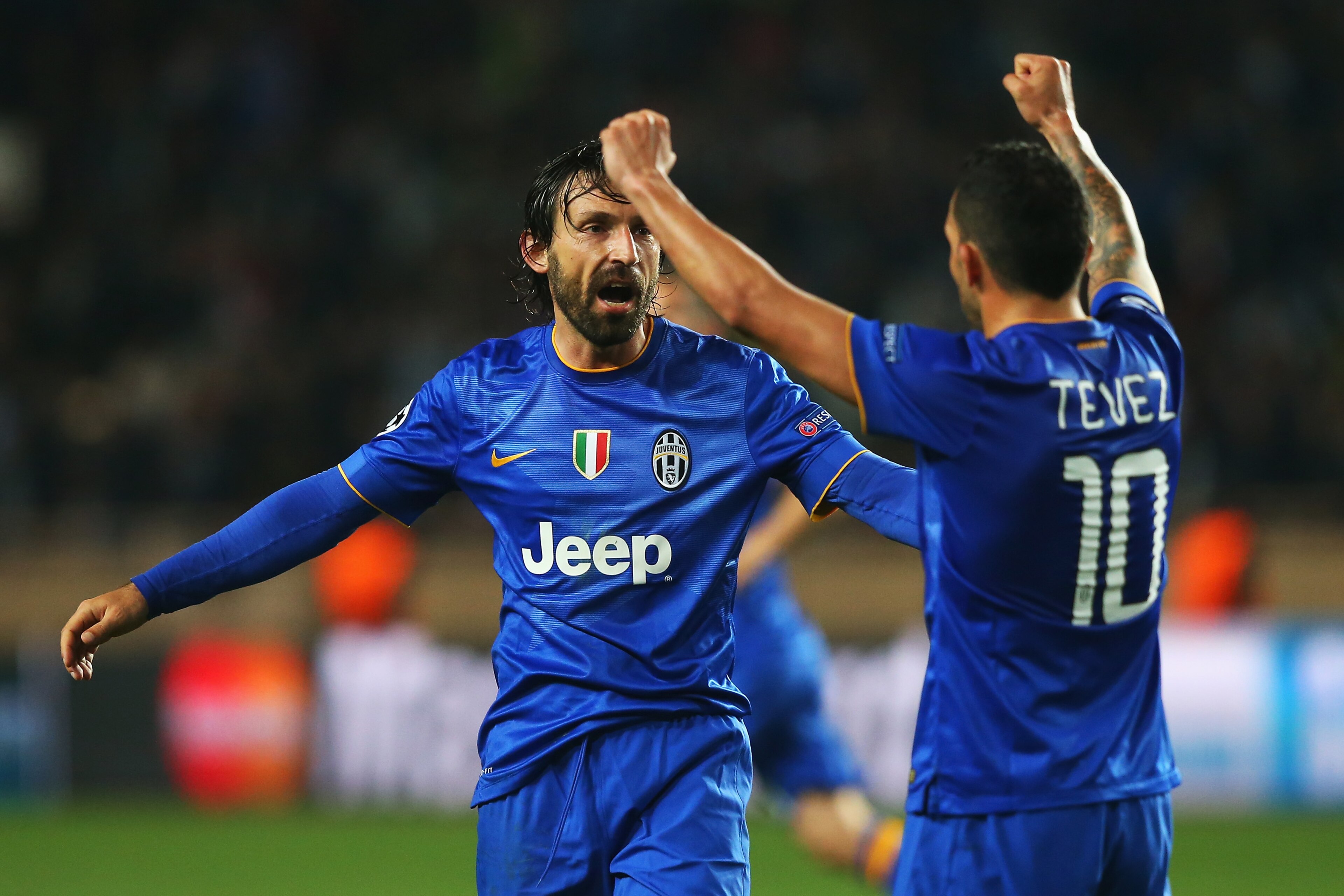 MONACO - APRIL 22: Andrea Pirlo (L) and Carlos Tevez of Juventus celebrate at the final whistle during the UEFA Champions League quarter-final second leg match between AS Monaco FC and Juventus at Stade Louis II on April 22, 2015 in Monaco, Monaco.  (Photo by Alex Livesey/Getty Images)