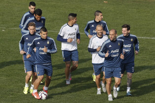 Argentina players jog during a training session in Vina del Mar, Chile, Saturday, June 27, 2015. Argentina defeated Colombia 5-4 on penalties after a 0-0 draw on Friday to reach the semifinals of the Copa America. (AP Photo/Andre Penner)