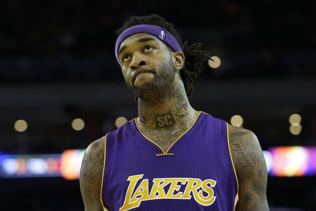 Los Angeles Lakers center Jordan Hill walks on the court during the second half of an NBA basketball game against the Golden State Warriors in Oakland, Calif., Monday, March 16, 2015. The Warriors won 108-105. (AP Photo/Jeff Chiu)