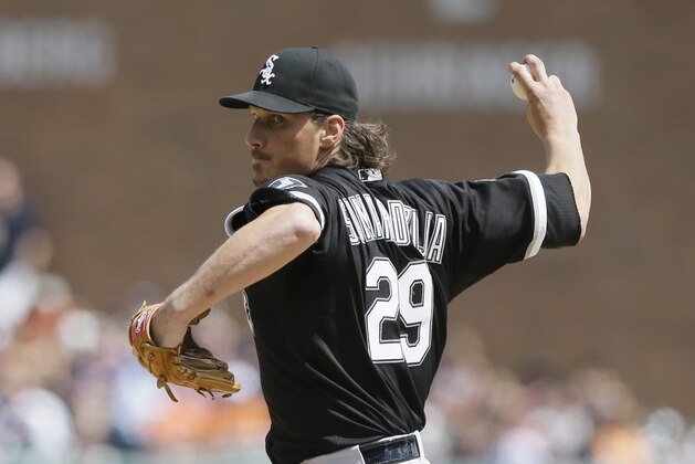 Chicago White Sox starting pitcher Jeff Samardzija throws during the eighth inning of a baseball game against the Detroit Tigers, Sunday, June 28, 2015, in Detroit. (AP Photo/Carlos Osorio)