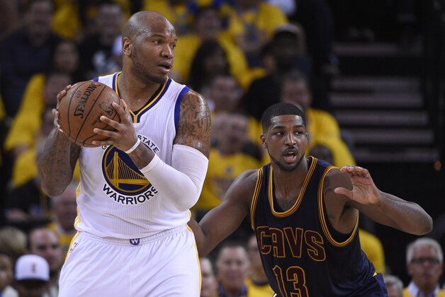 Jun 4, 2015; Oakland, CA, USA; Golden State Warriors center Marreese Speights (5) handles the ball against Cleveland Cavaliers center Tristan Thompson (13) during the second quarter in game one of the NBA Finals at Oracle Arena. Mandatory Credit: Kyle Terada-USA TODAY Sports