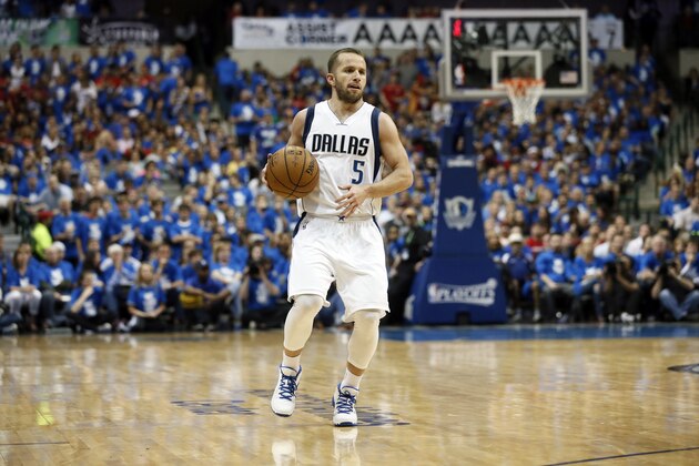 Dallas Mavericks' J.J. Barea of Puerto Rico handles the ball during Game 4 in an NBA basketball first-round playoff series Sunday April 26, 2015, in Dallas. (AP Photo/Tony Gutierrez)