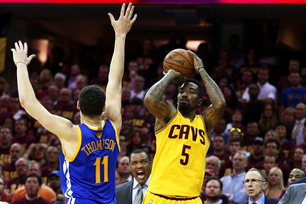 CLEVELAND, OH - JUNE 11:  J.R. Smith #5 of the Cleveland Cavaliers shoots against Klay Thompson #11 of the Golden State Warriors in the fourth quarter during Game Four of the 2015 NBA Finals at Quicken Loans Arena on June 11, 2015 in Cleveland, Ohio.  NOTE TO USER: User expressly acknowledges and agrees that, by downloading and or using this photograph, user is consenting to the terms and conditions of Getty Images License Agreement.  (Photo by Ronald Martinez/Getty Images)