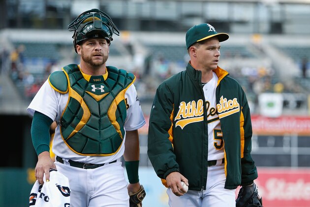 OAKLAND, CA - APRIL 28: Stephen Vogt #21 (left) and Sonny Gray #54 of the Oakland Athletics look on before the game against the Los Angeles Angels of Anaheim at O.co Coliseum on April 28, 2015 in Oakland, California. (Photo by Lachlan Cunningham/Getty Images)