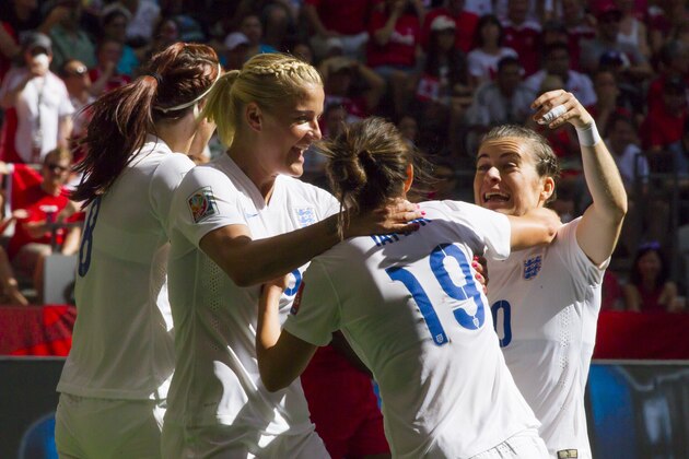 VANCOUVER, BC - JUNE 27: Jodie Taylor #19 of England celebrates her goal against Canada with teammates Karen Carney #10 and Steph Houghton #5 during the FIFA Women's World Cup Canada 2015 Quarter Final match between the England and Canada June 27, 2015 at BC Place Stadium in Vancouver, British Columbia, Canada.  (Photo by Ben Nelms/Getty Images)